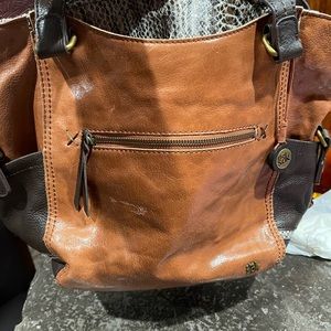 Sak purse.  Gently used.  One blemish.  Smoke free, pet free home.